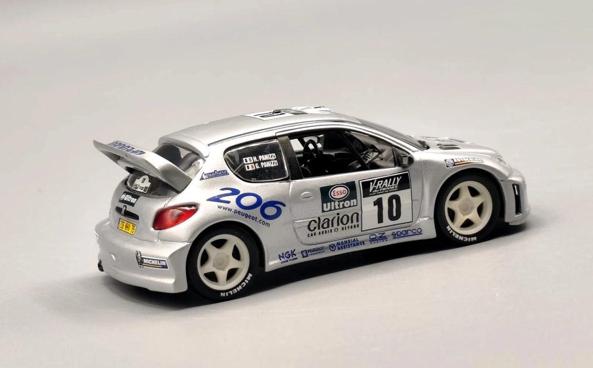 PEUGEOT 206 WRC 1ER TOUR DE CORSE 2000 / G. PANZINI/ H. PANZINI / IXO /1/43