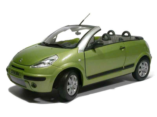 C3 PLURIELE CITROEN ET SES ACCESOIRS  NOREV VERTE 1/18(MANQUE LA POIGNER SUR LE COFFRE ARRIERE)
