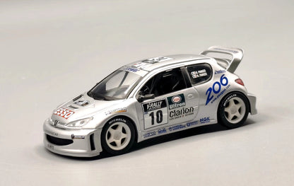 PEUGEOT 206 WRC 1ER TOUR DE CORSE 2000 / G. PANZINI/ H. PANZINI / IXO /1/43