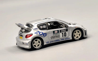 PEUGEOT 206 WRC 1ER TOUR DE CORSE 2000 / G. PANZINI/ H. PANZINI / IXO /1/43